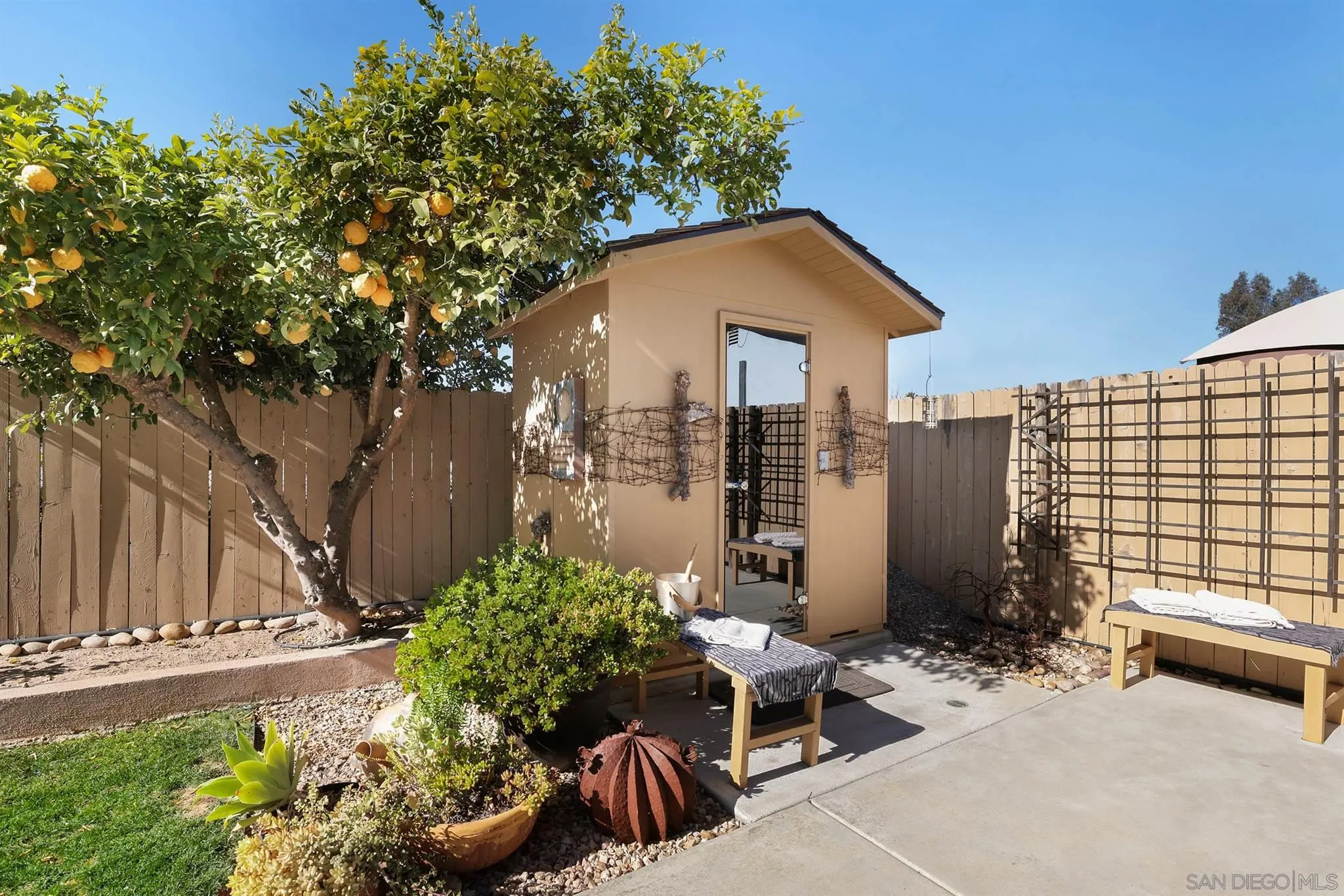 13716 Frame Road Poway, CA 92064 - Photo 30 of 34 a backyard of a house with yard and outdoor seating