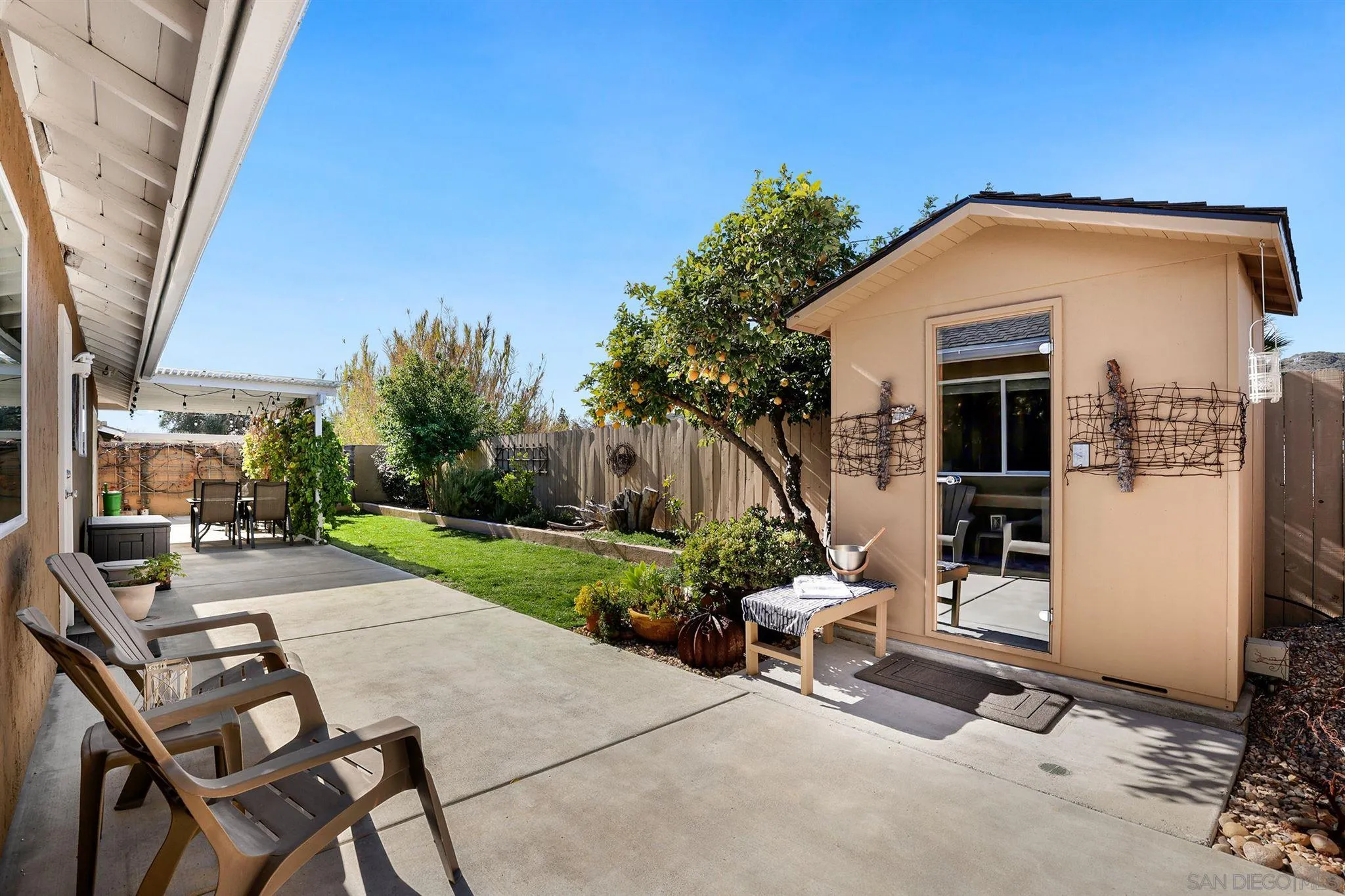 13716 Frame Road Poway, CA 92064 - Photo 31 of 34 a view of backyard with outdoor seating and plants