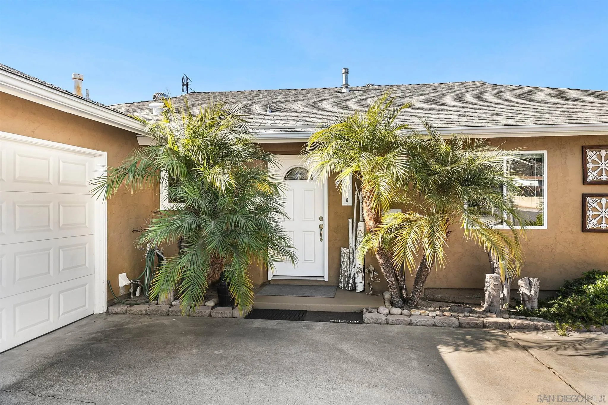 13716 Frame Road Poway, CA 92064 - Photo 34 of 34 a view of a palm trees in front of a building