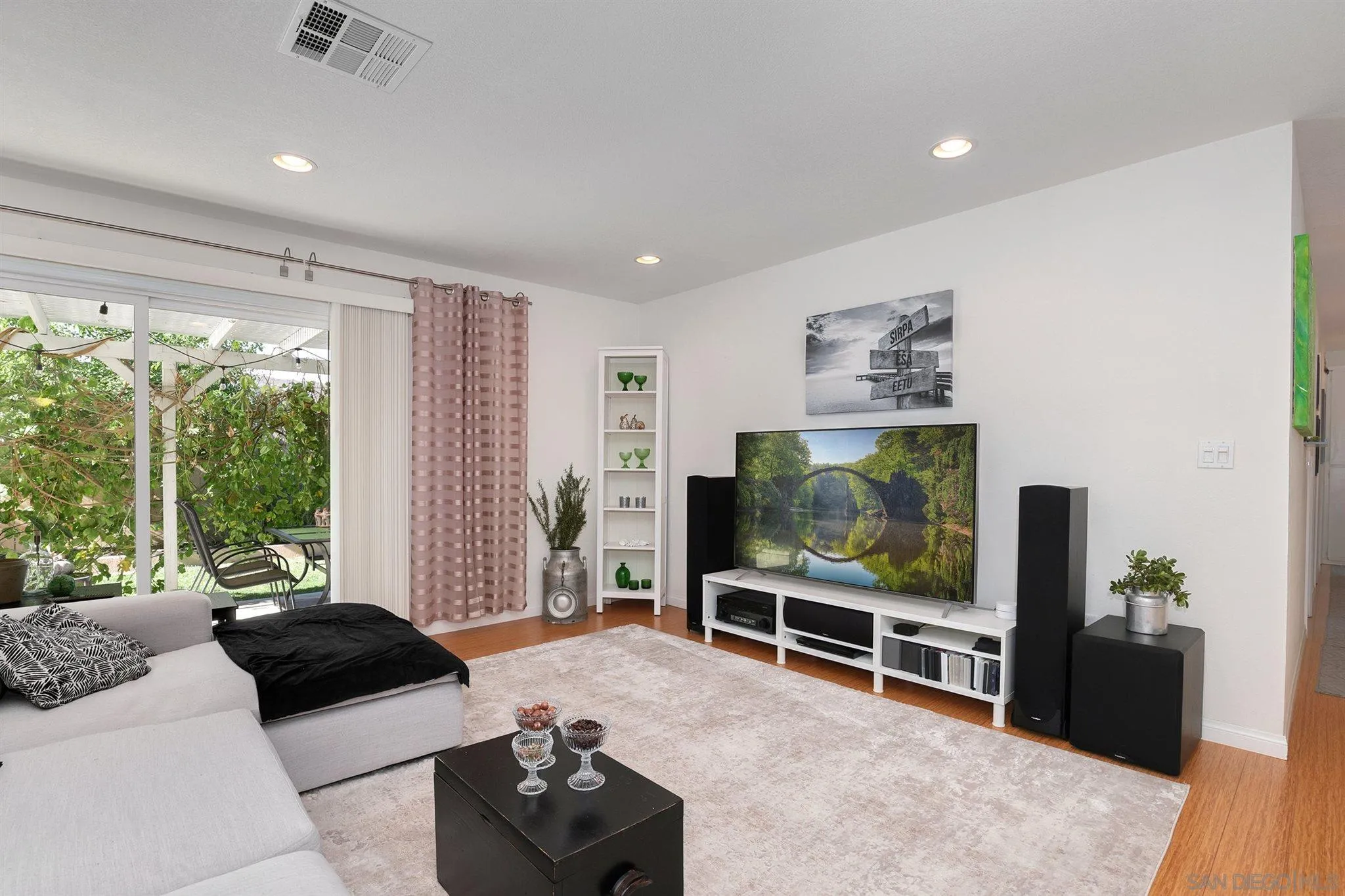 13716 Frame Road Poway, CA 92064 - Photo 4 of 34 a bedroom with furniture and a flat screen tv