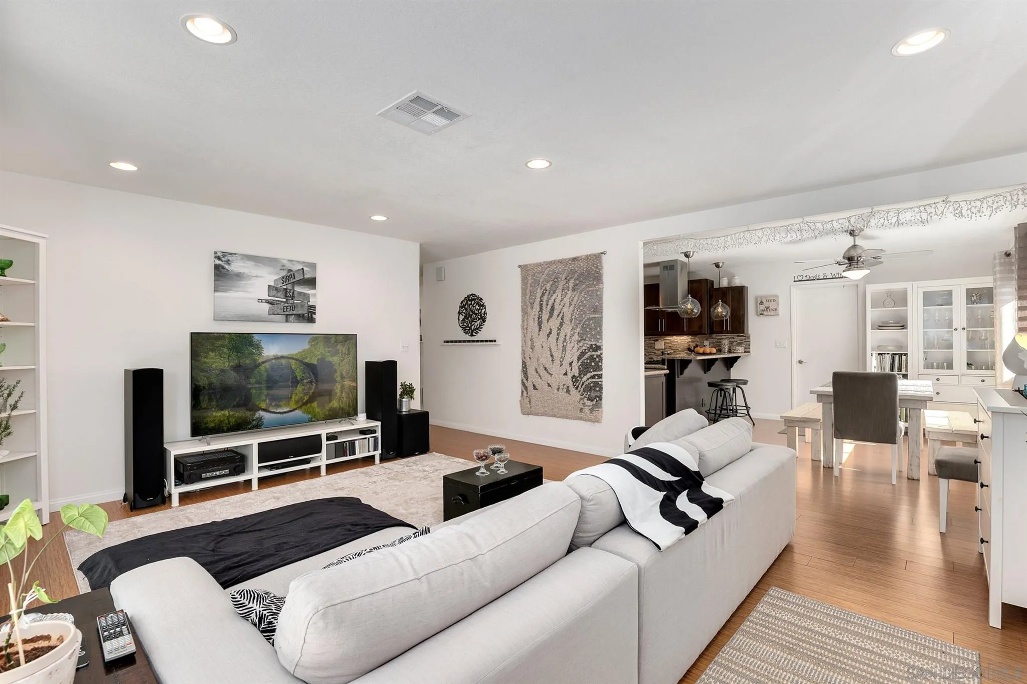 13716 Frame Road Poway, CA 92064 - Photo 5 of 34 a living room with furniture and a flat screen tv