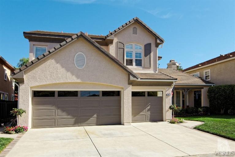 287 Knoll Ridge Road Simi Valley, CA 93065 - Photo 2 of 36 a front view of a house with a garden