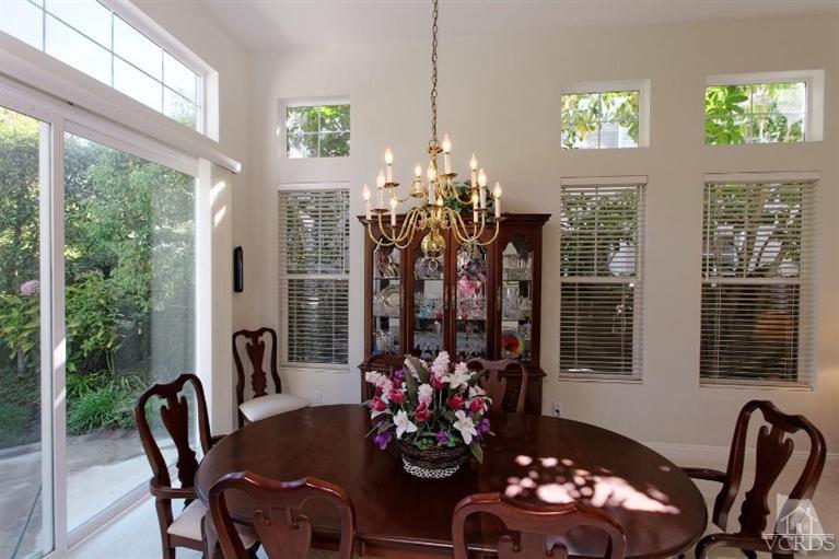287 Knoll Ridge Road Simi Valley, CA 93065 - Photo 15 of 36 a view of a dining room with furniture window and outside view
