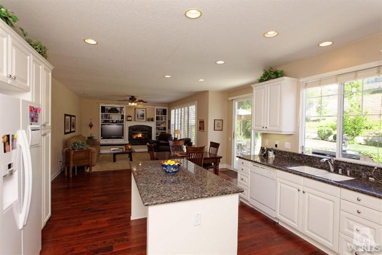 287 Knoll Ridge Road Simi Valley, CA 93065 - Photo 20 of 36 a kitchen with lots of counter top space and living room
