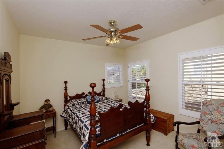 287 Knoll Ridge Road Simi Valley, CA 93065 - Photo 23 of 36 a bed room with a bed and a window
