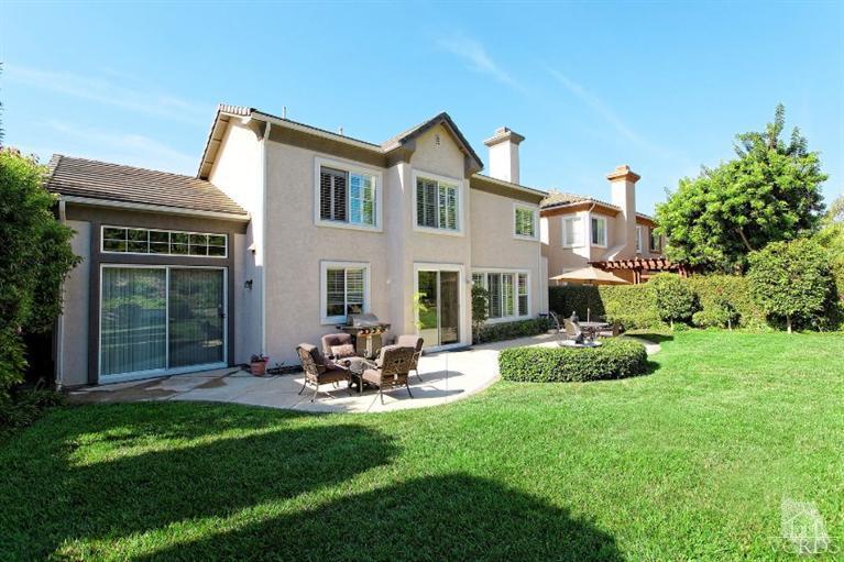 287 Knoll Ridge Road Simi Valley, CA 93065 - Photo 30 of 36 a view of a house with backyard sitting area and garden