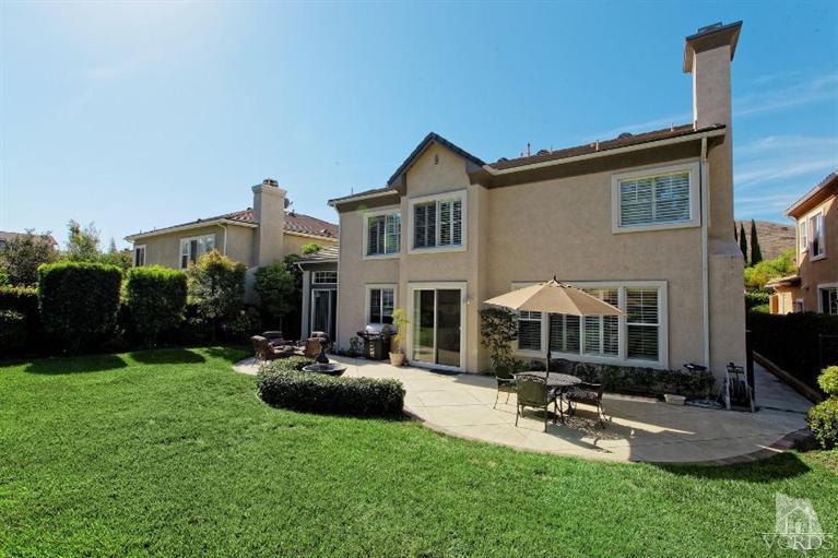 287 Knoll Ridge Road Simi Valley, CA 93065 - Photo 31 of 36 a view of a house with backyard porch and sitting area