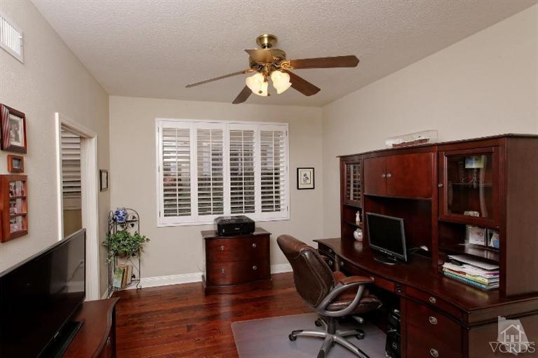 287 Knoll Ridge Road Simi Valley, CA 93065 - Photo 7 of 36 a view of a workspace with furniture and a window