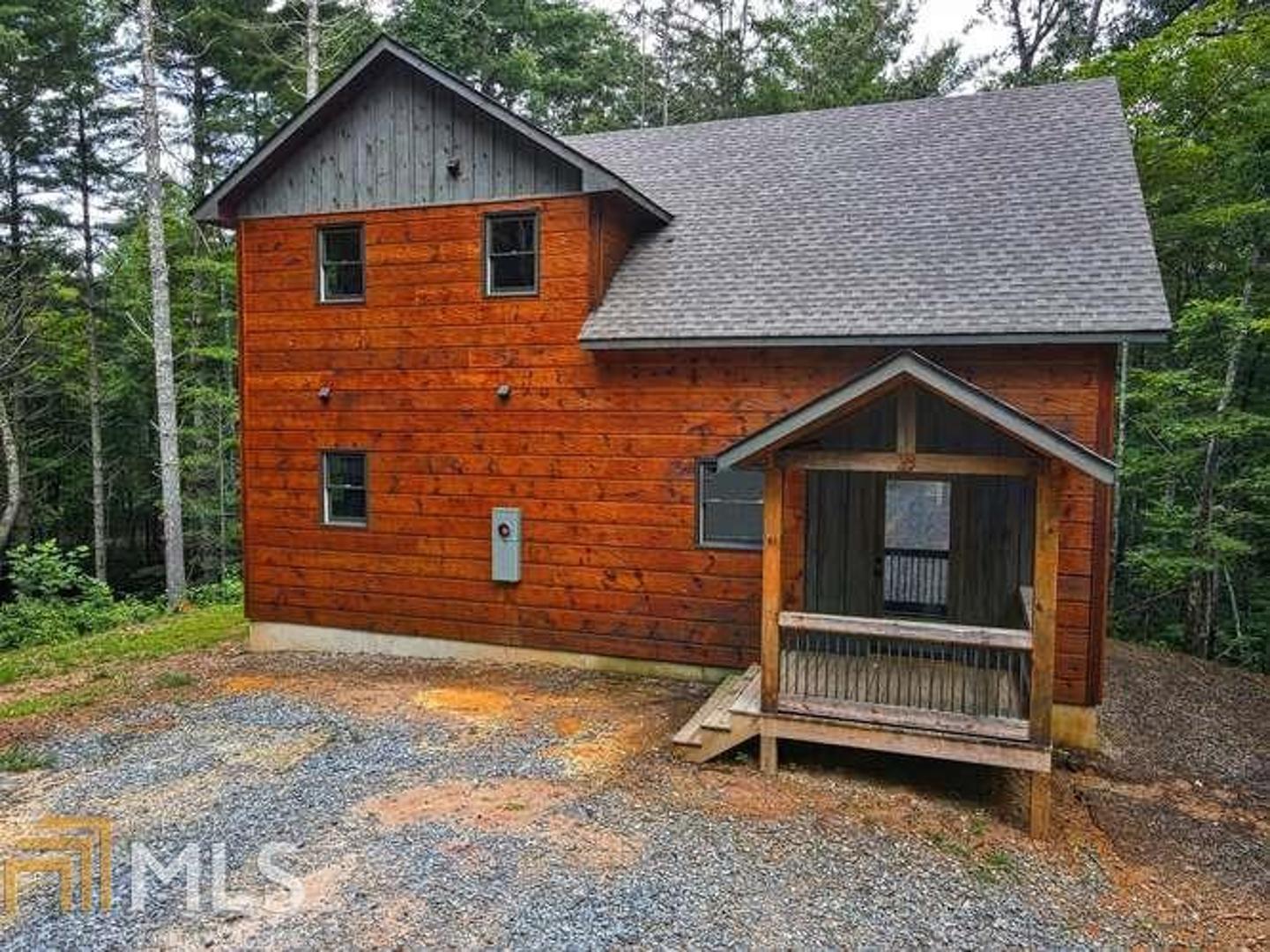 0 Watson Road, Unit TR 1 Epworth, GA 30541 - Photo 1 of 1 a front view of a house with a yard