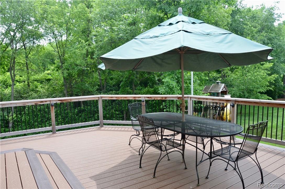 7026 Oakhurst Ridge Road Clarkston, MI 48348 - Photo 28 of 30 Beautiful composite deck overlooks picturesque lot and woods