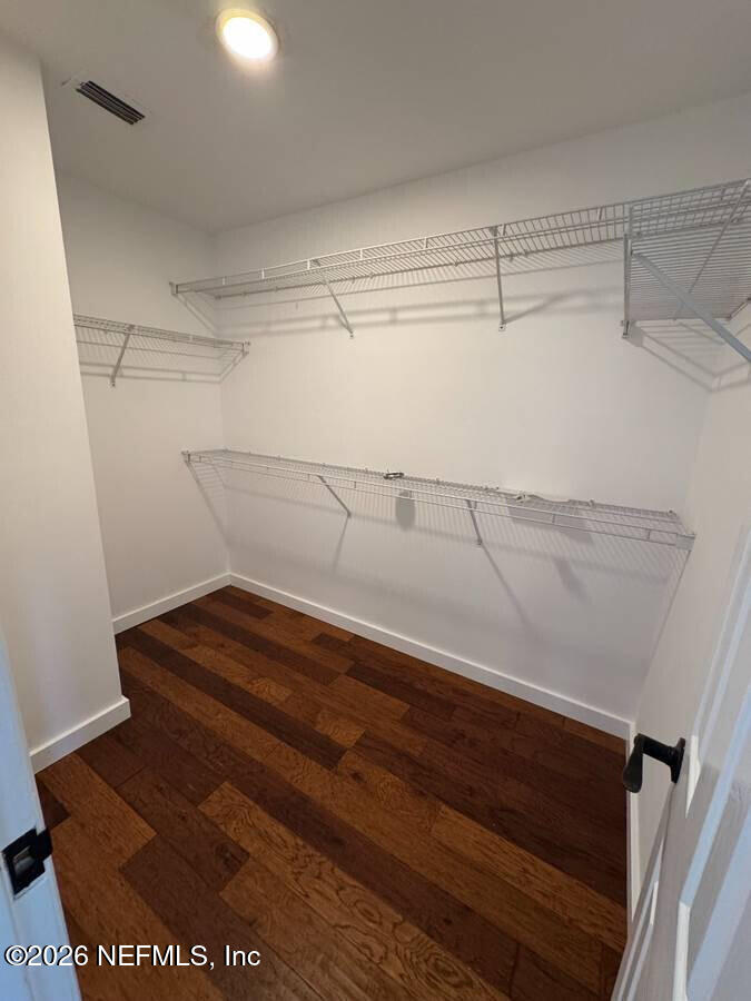 543 Ray Edwards Road St. Augustine, FL 32086 - Photo 15 of 19 a view of a room with racks on the wall