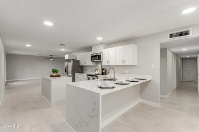 a view of kitchen with appliances