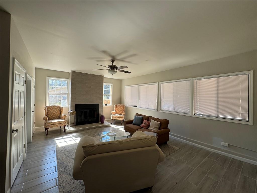 3080 Forrest Park Road Southeast Atlanta, GA 30354 - Photo 13 of 17 a living room with furniture and a fireplace