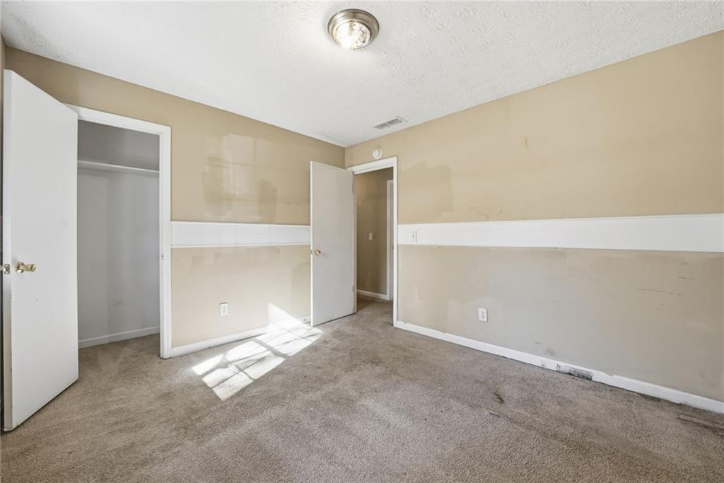 255 Countryside Lane Covington, GA 30016 - Photo 25 of 35 a view of an empty room