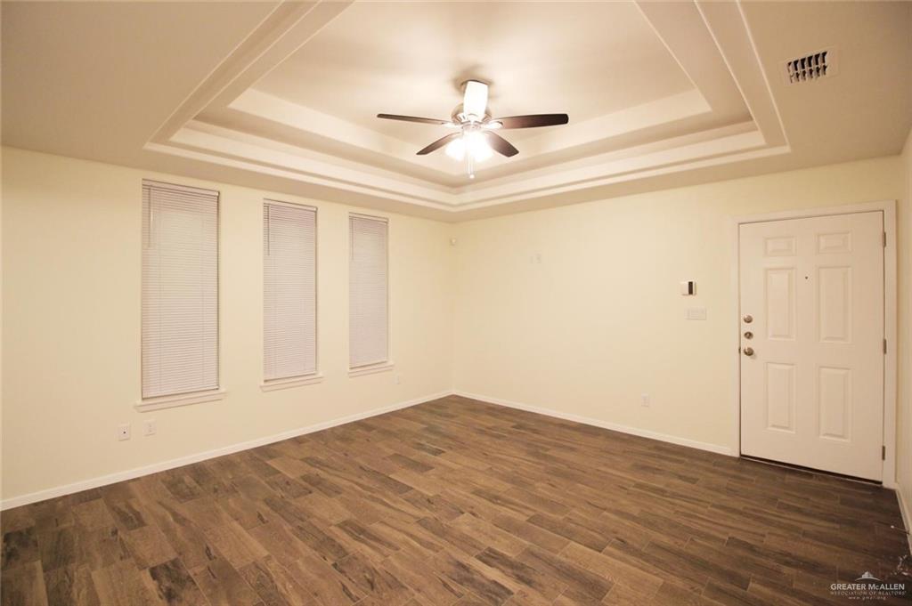 1507 Coyote Hills, Unit 4 Edinburg, TX 78541 - Photo 6 of 12 a view of empty room with wooden floor