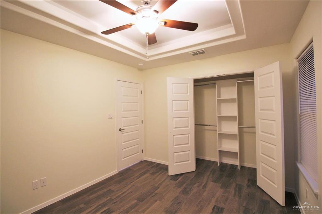 1507 Coyote Hills, Unit 4 Edinburg, TX 78541 - Photo 8 of 12 wooden floor in an empty room
