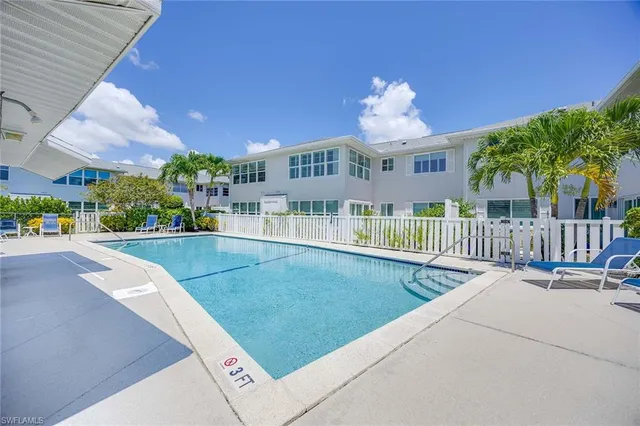 a view of a house with a swimming pool