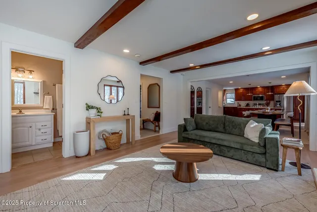 a kitchen with stainless steel appliances granite countertop a stove sink and cabinets