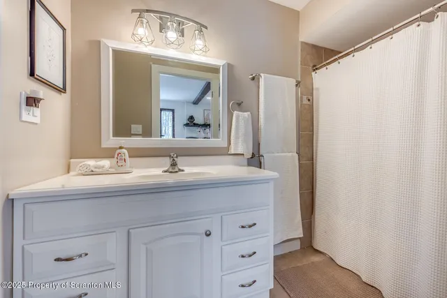 a close view of a utility room with dryer and washer