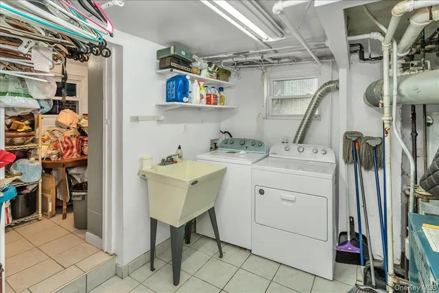 a utility room with cabinets