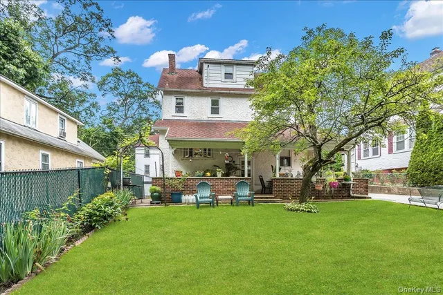 a view of a building with a yard
