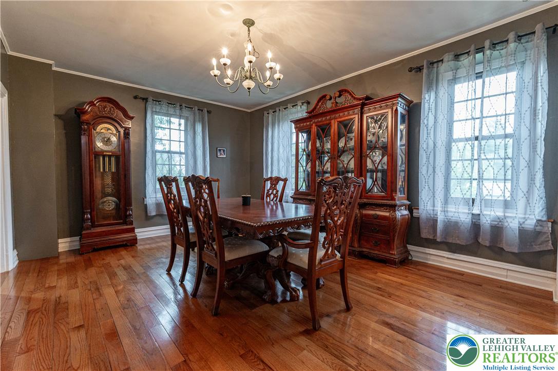 2485 Hieter Road Quakertown, PA 18951 - Photo 23 of 97 Ornate wood details and gleaming hardwood floors define this traditional dining space.