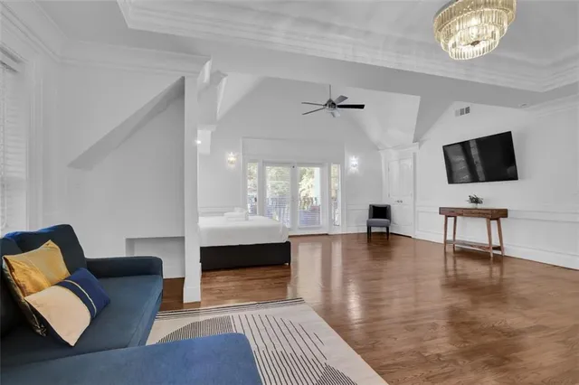 a view of entryway with wooden floor and stairs