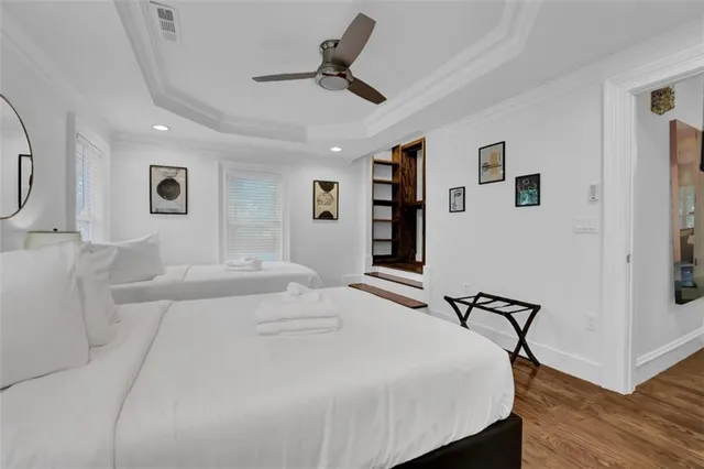 a kitchen with stainless steel appliances granite countertop a sink a stove a microwave a refrigerator and cabinets