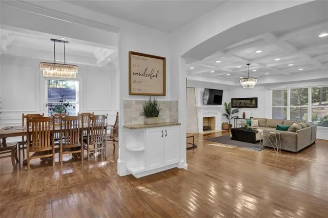 a bedroom with a large bed and a large window