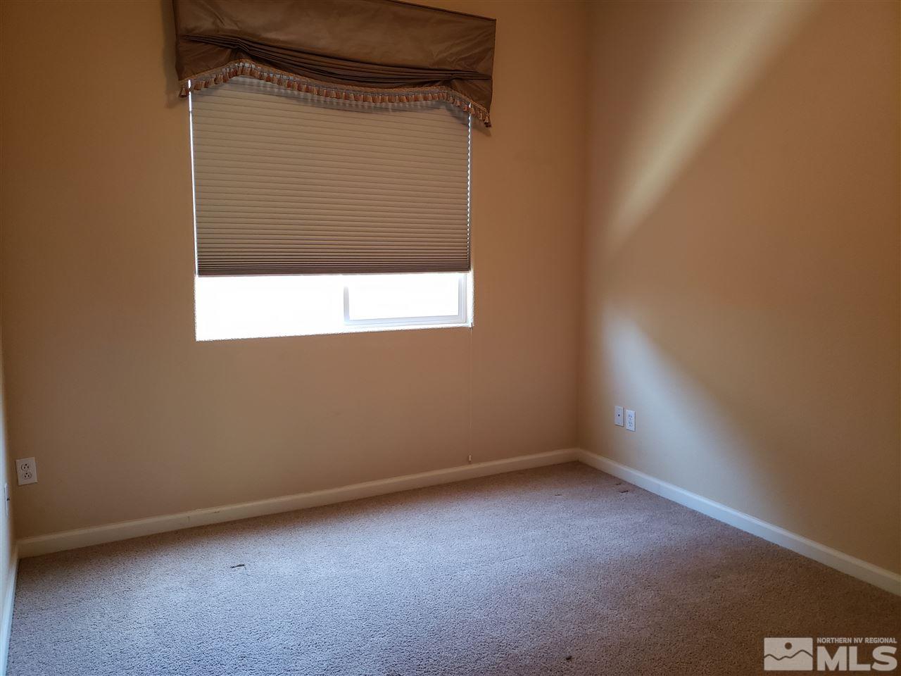 1680 Emerald Bay Drive Reno, NV 89521 - Photo 19 of 27 an empty room with a window