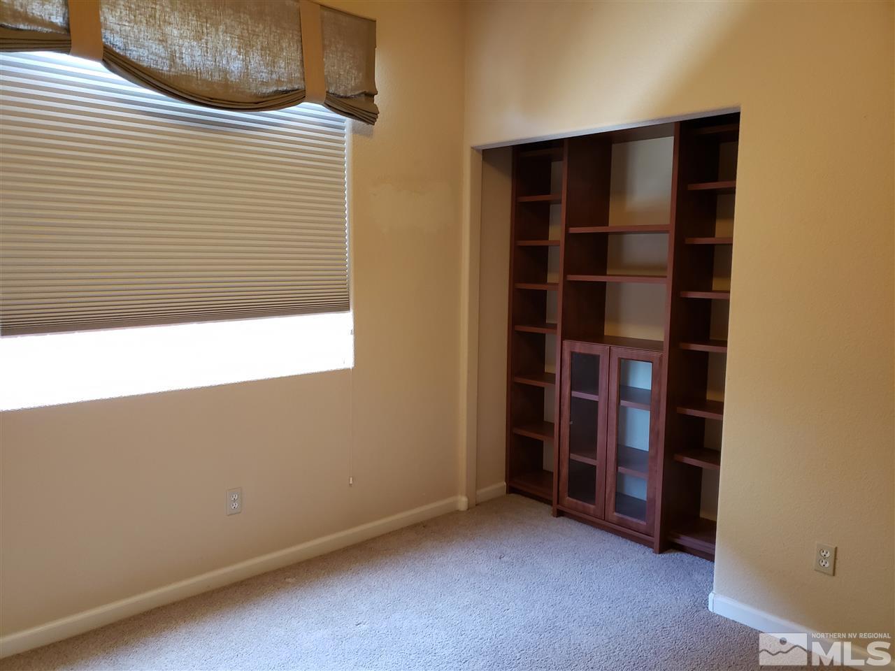 1680 Emerald Bay Drive Reno, NV 89521 - Photo 20 of 27 a view of an empty room with a window