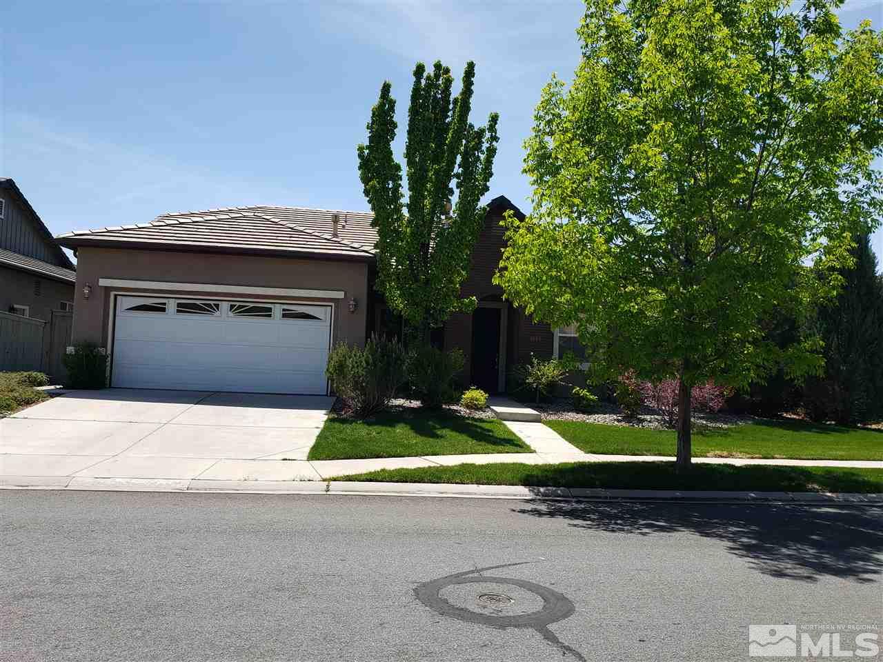 1680 Emerald Bay Drive Reno, NV 89521 - Photo 2 of 27 a house with yard in front of it