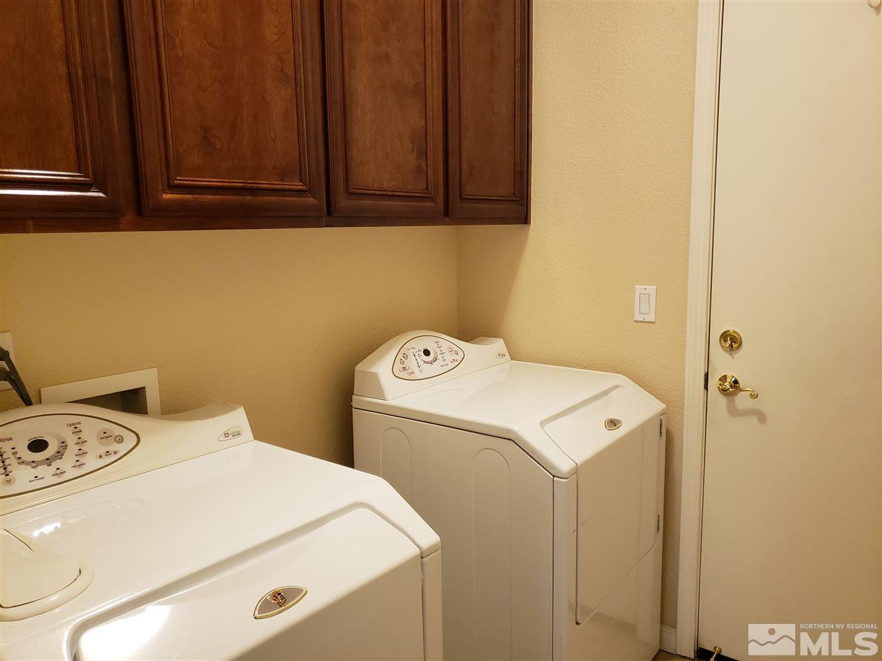 1680 Emerald Bay Drive Reno, NV 89521 - Photo 23 of 27 a utility room with dryer and washer