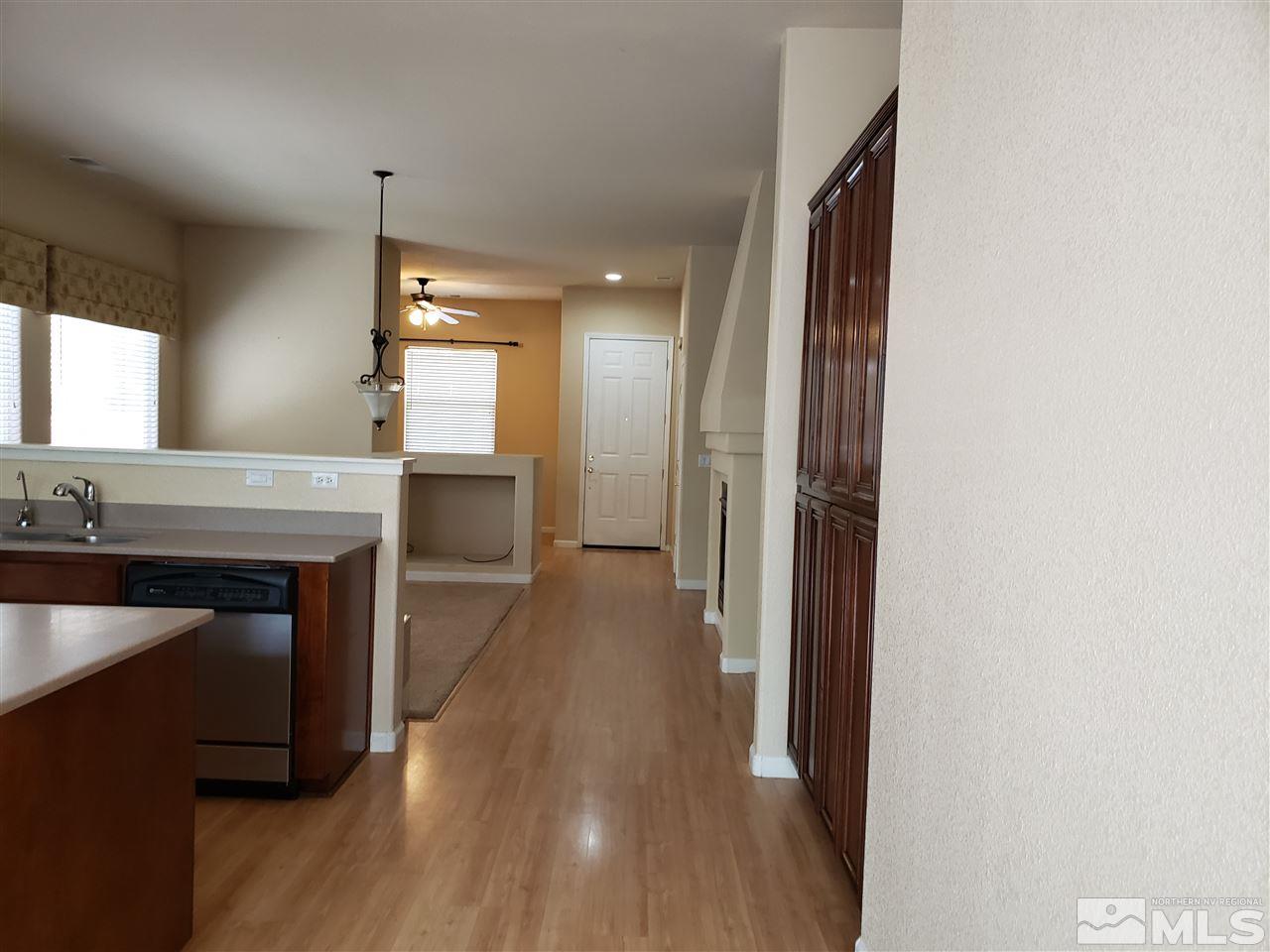 1680 Emerald Bay Drive Reno, NV 89521 - Photo 5 of 27 a view of a kitchen from the hallway
