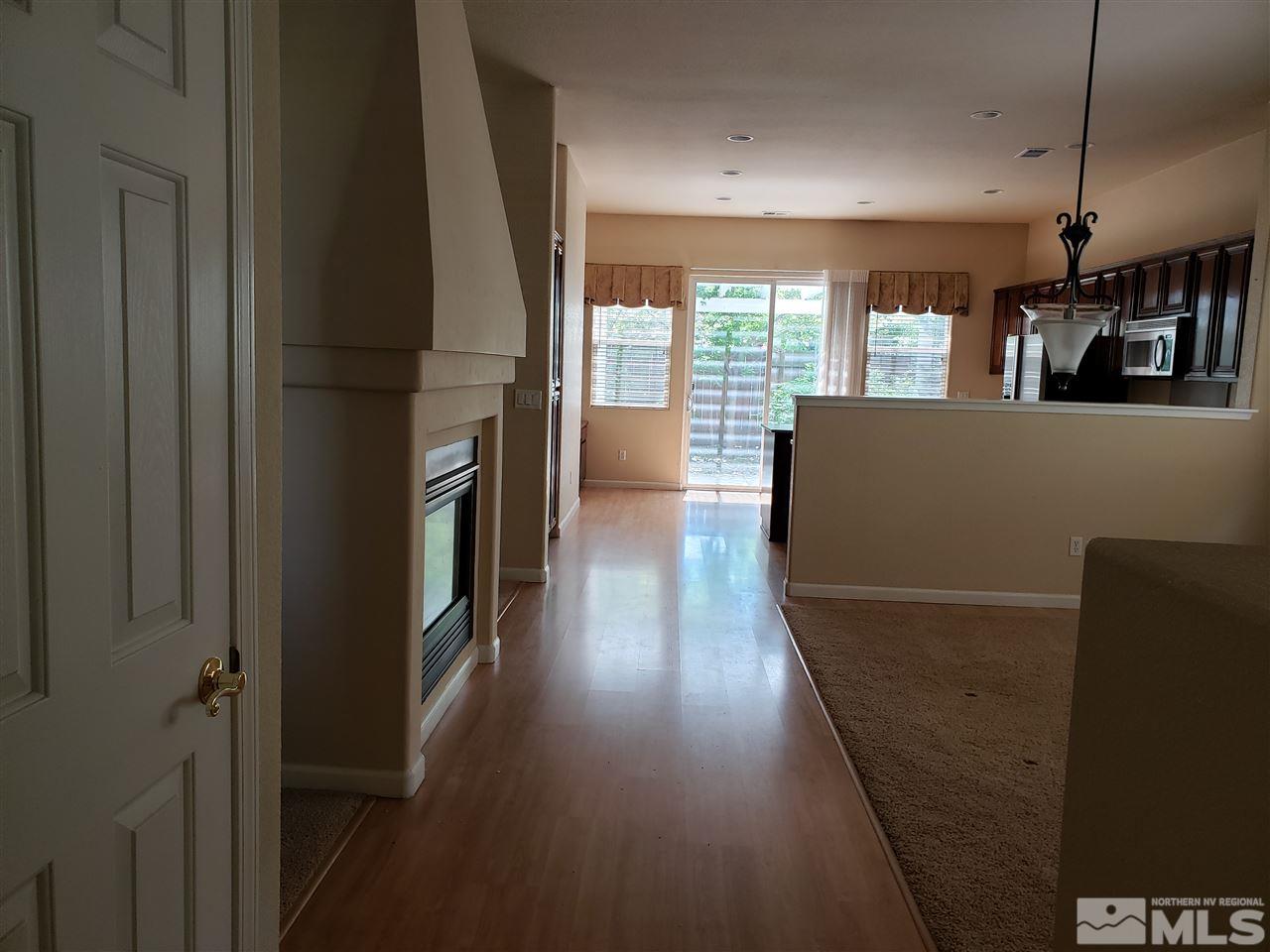 1680 Emerald Bay Drive Reno, NV 89521 - Photo 6 of 27 a view of livingroom with furniture wooden floor and window