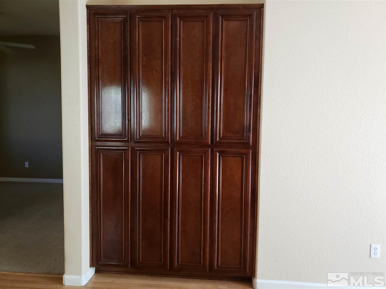 1680 Emerald Bay Drive Reno, NV 89521 - Photo 8 of 27 a view of door with wooden floor