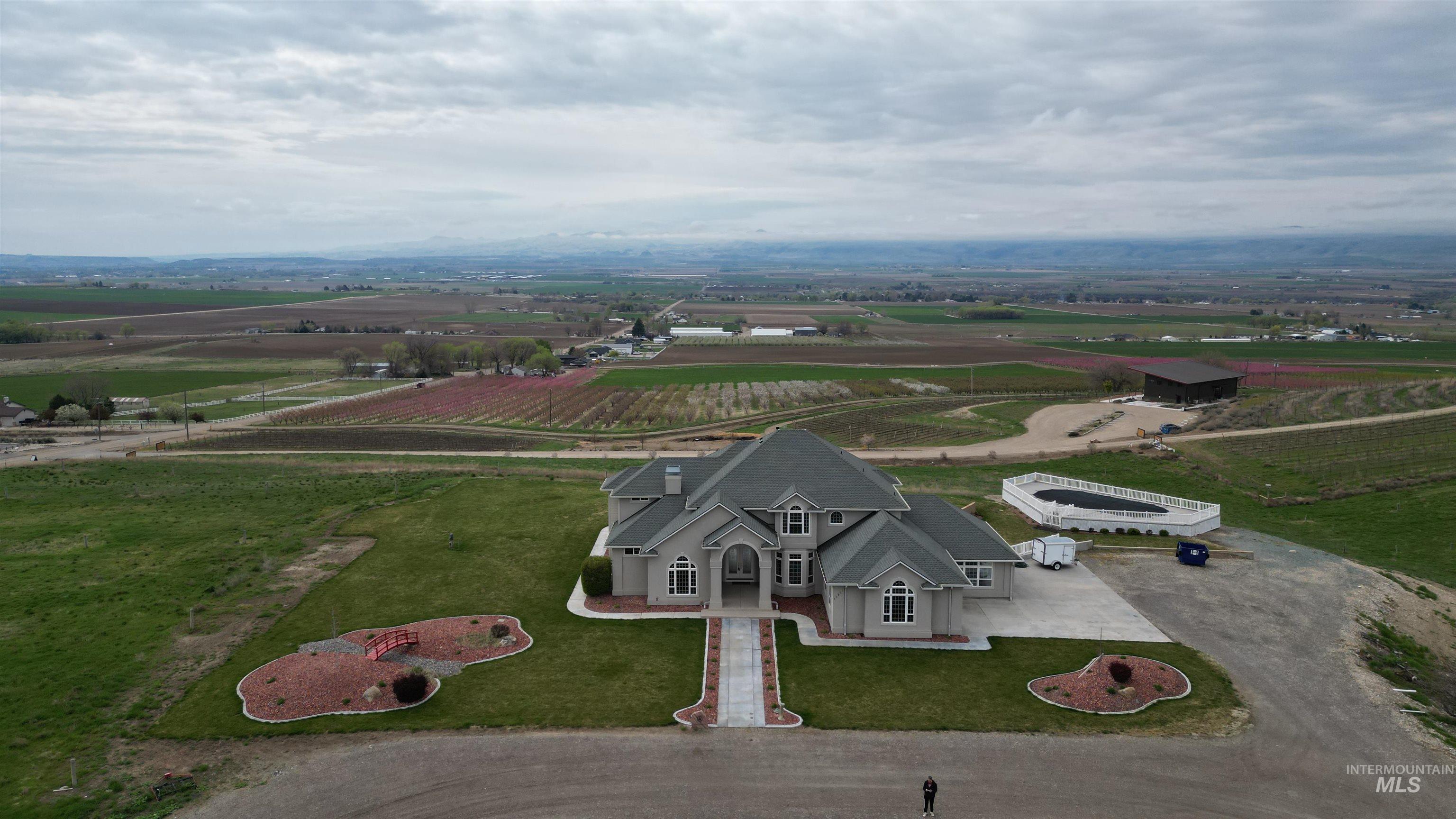 Aerial view of the front of the house and the Snake River Valley