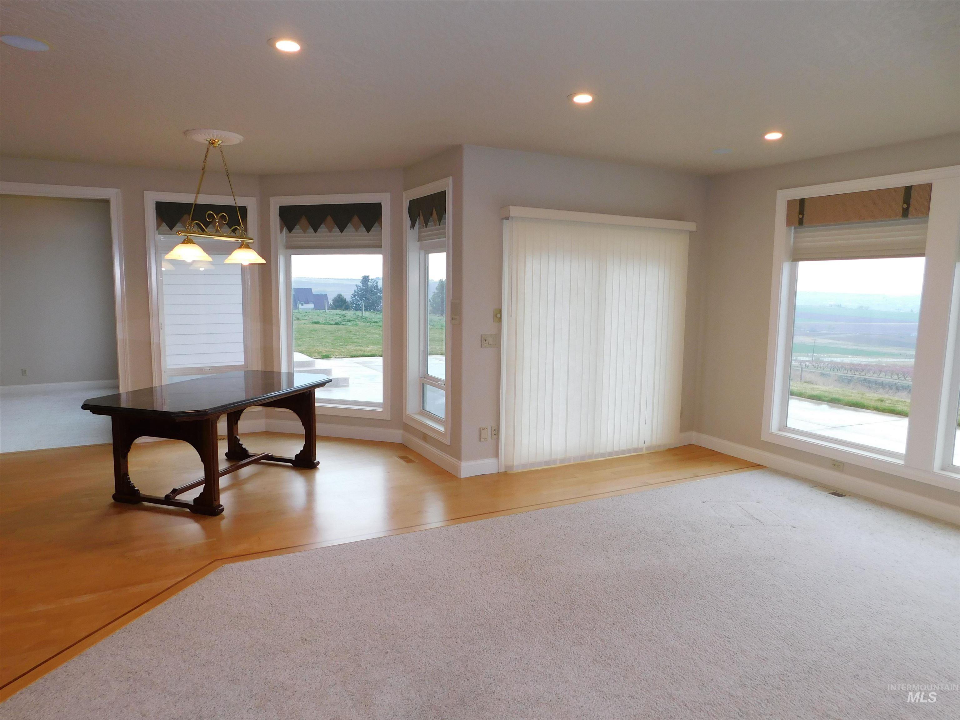 17777 Allendale Road Wilder, ID 83676 - Photo 13 of 50 Dining room featuring recessed lighting, plenty of natural light, and light colored carpet