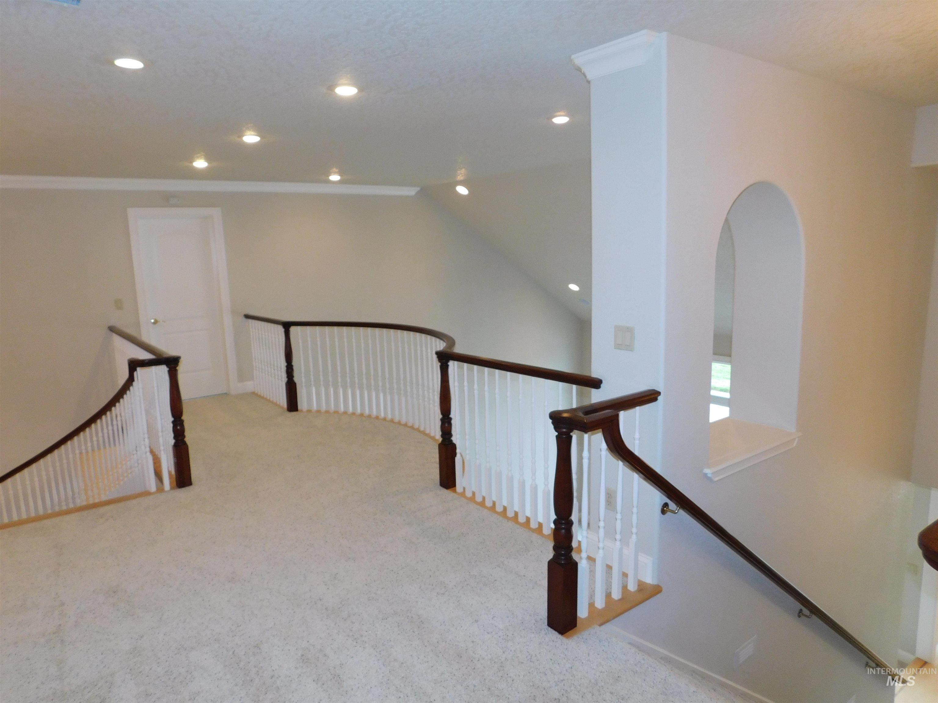 17777 Allendale Road Wilder, ID 83676 - Photo 18 of 50 Corridor with light carpet, recessed lighting