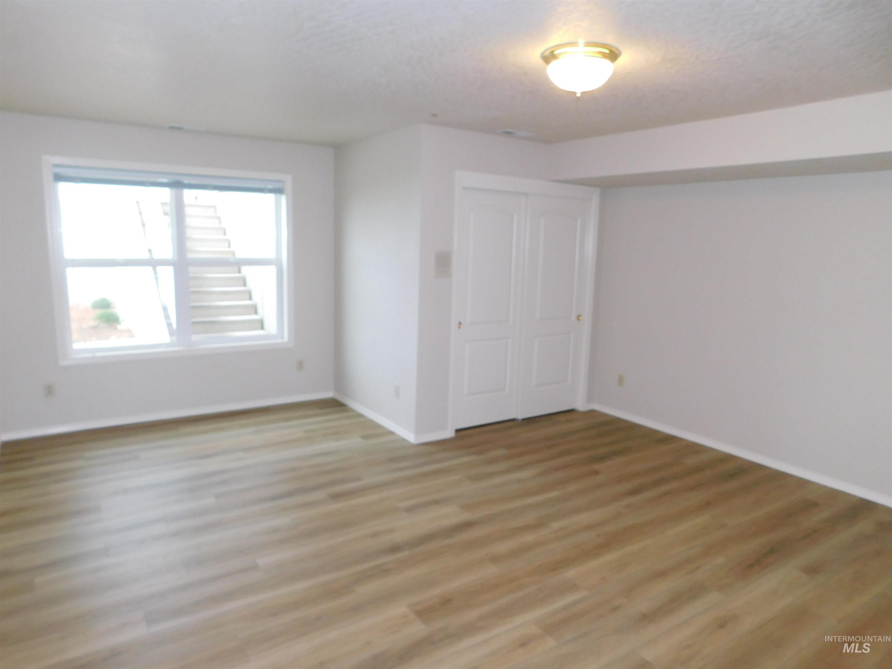 17777 Allendale Road Wilder, ID 83676 - Photo 23 of 50 New LVP flooring and a closet
