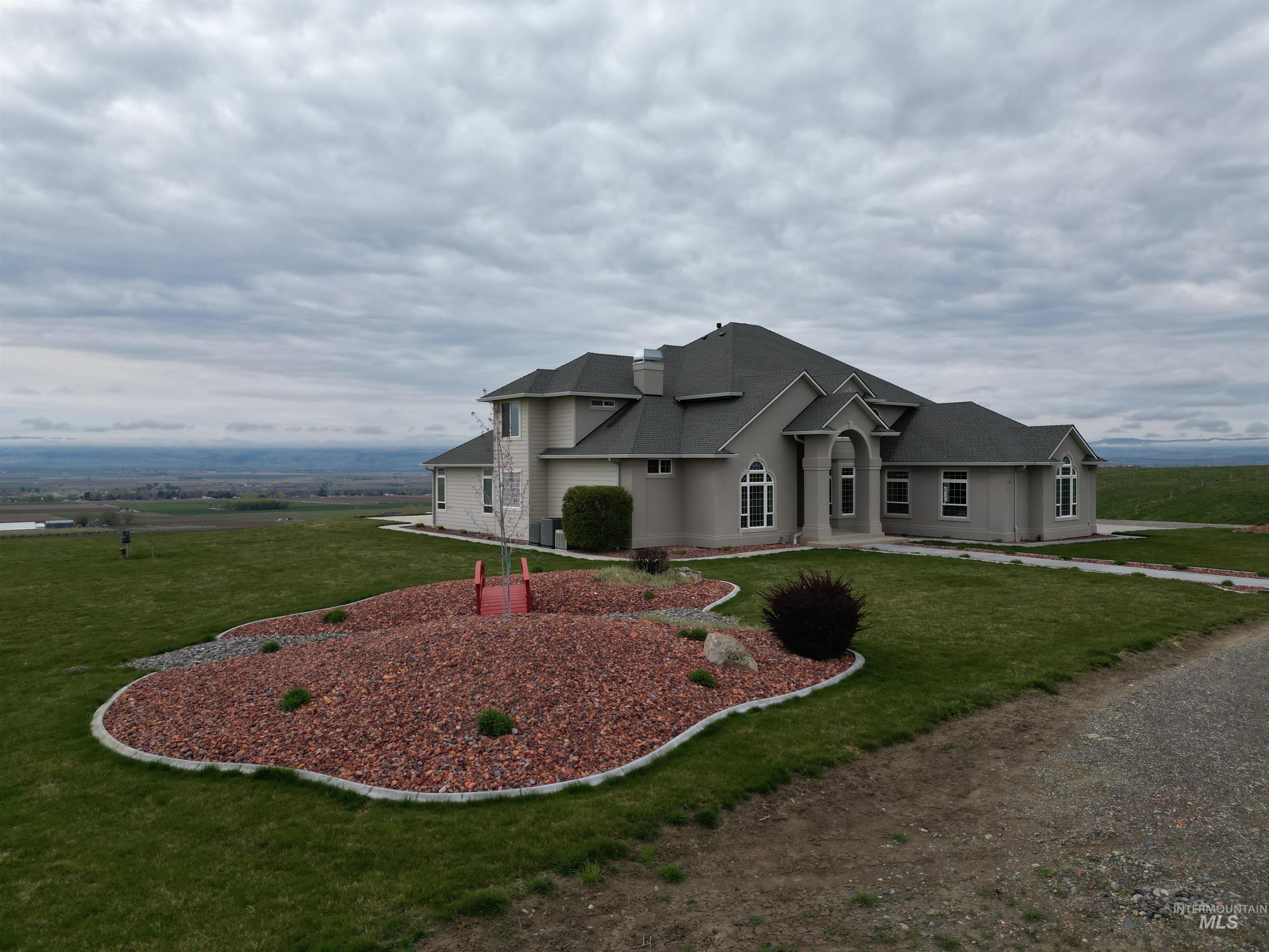17777 Allendale Road Wilder, ID 83676 - Photo 39 of 50 View of front of property featuring a front yard and a shingled roof