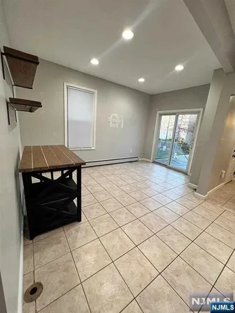 a living room with a couch and a table