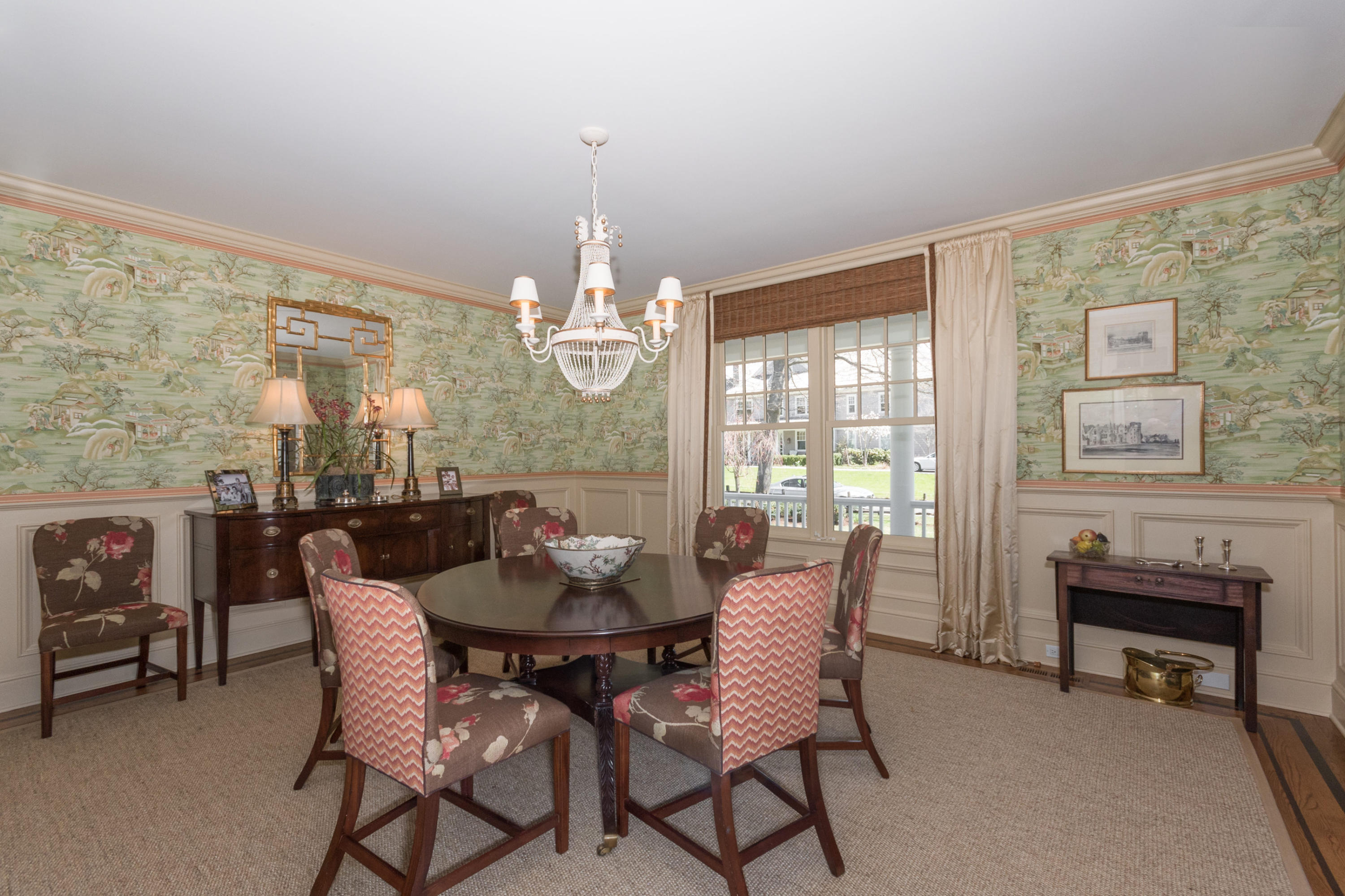 15 Seagate Road Darien, CT 06820 - Photo 13 of 48 a view of a dining room with furniture wooden floor and chandelier