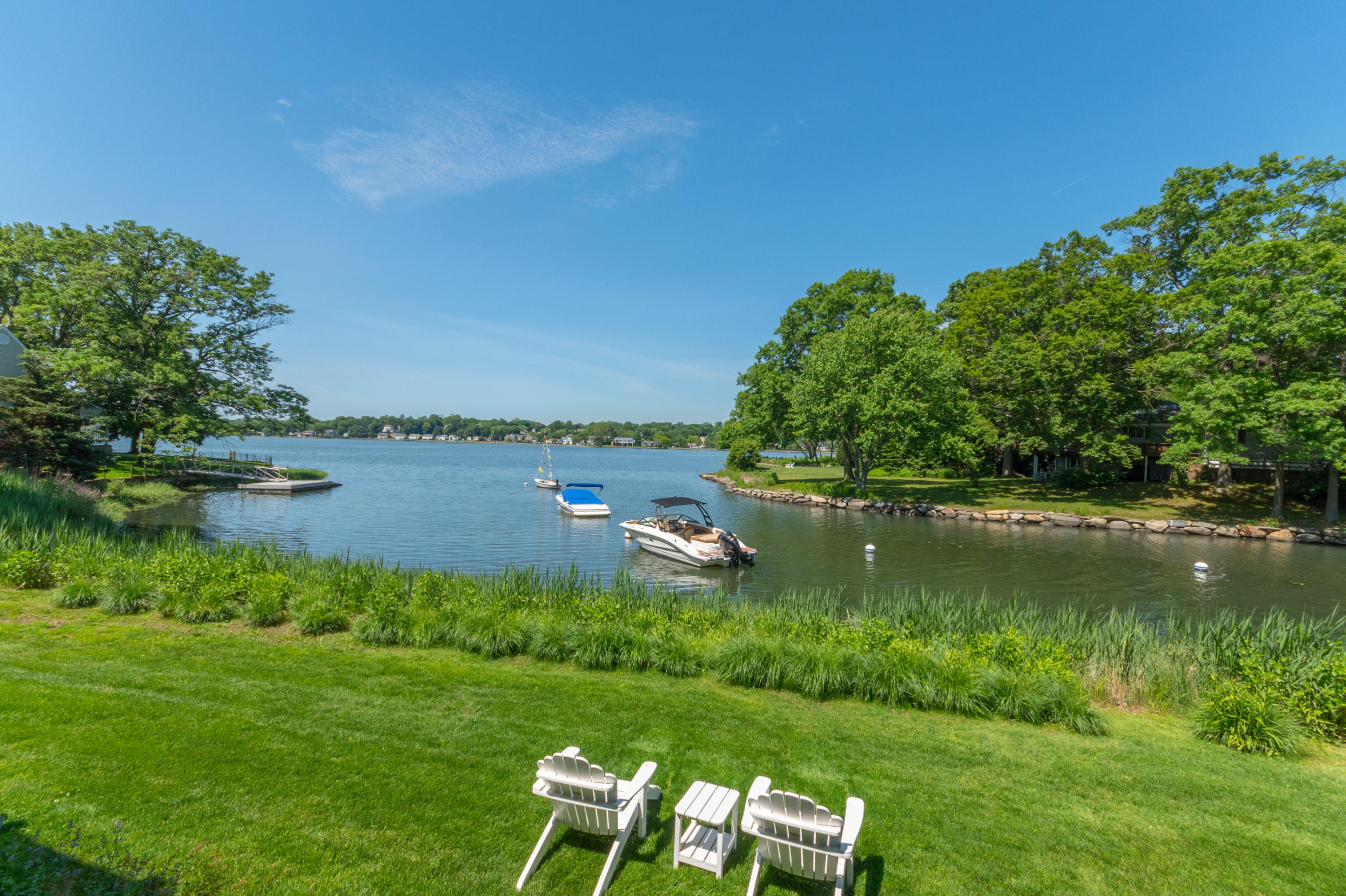 15 Seagate Road Darien, CT 06820 - Photo 3 of 48 a view of a lake with houses in the back