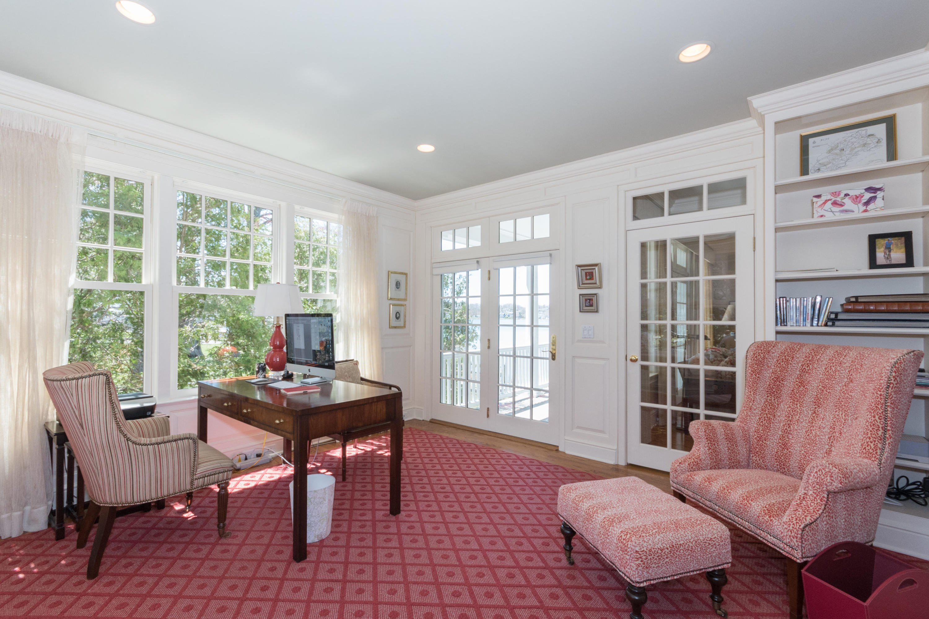 15 Seagate Road Darien, CT 06820 - Photo 22 of 48 a living room with furniture and floor to ceiling windows