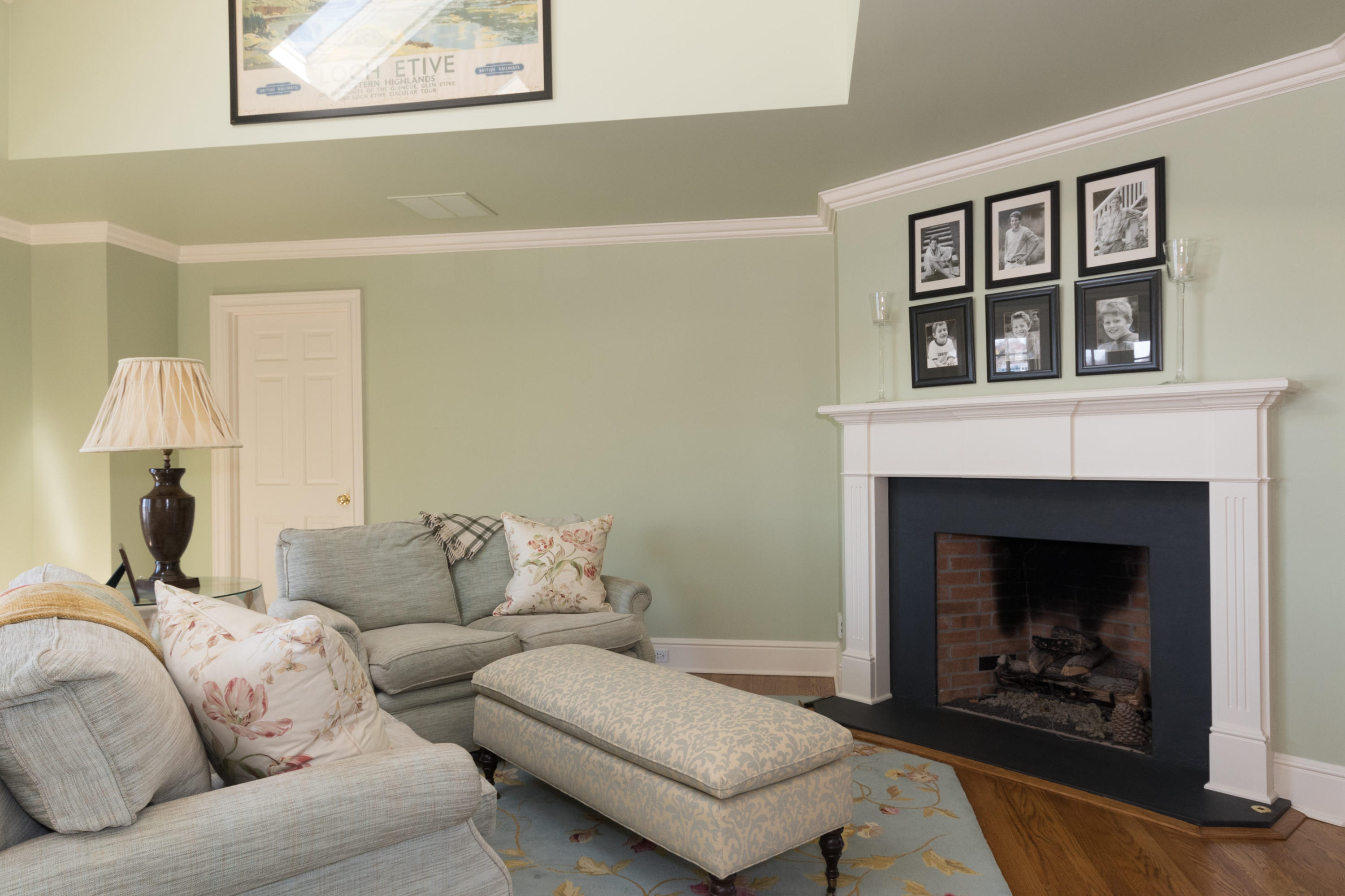 15 Seagate Road Darien, CT 06820 - Photo 26 of 48 a living room with furniture and a fireplace