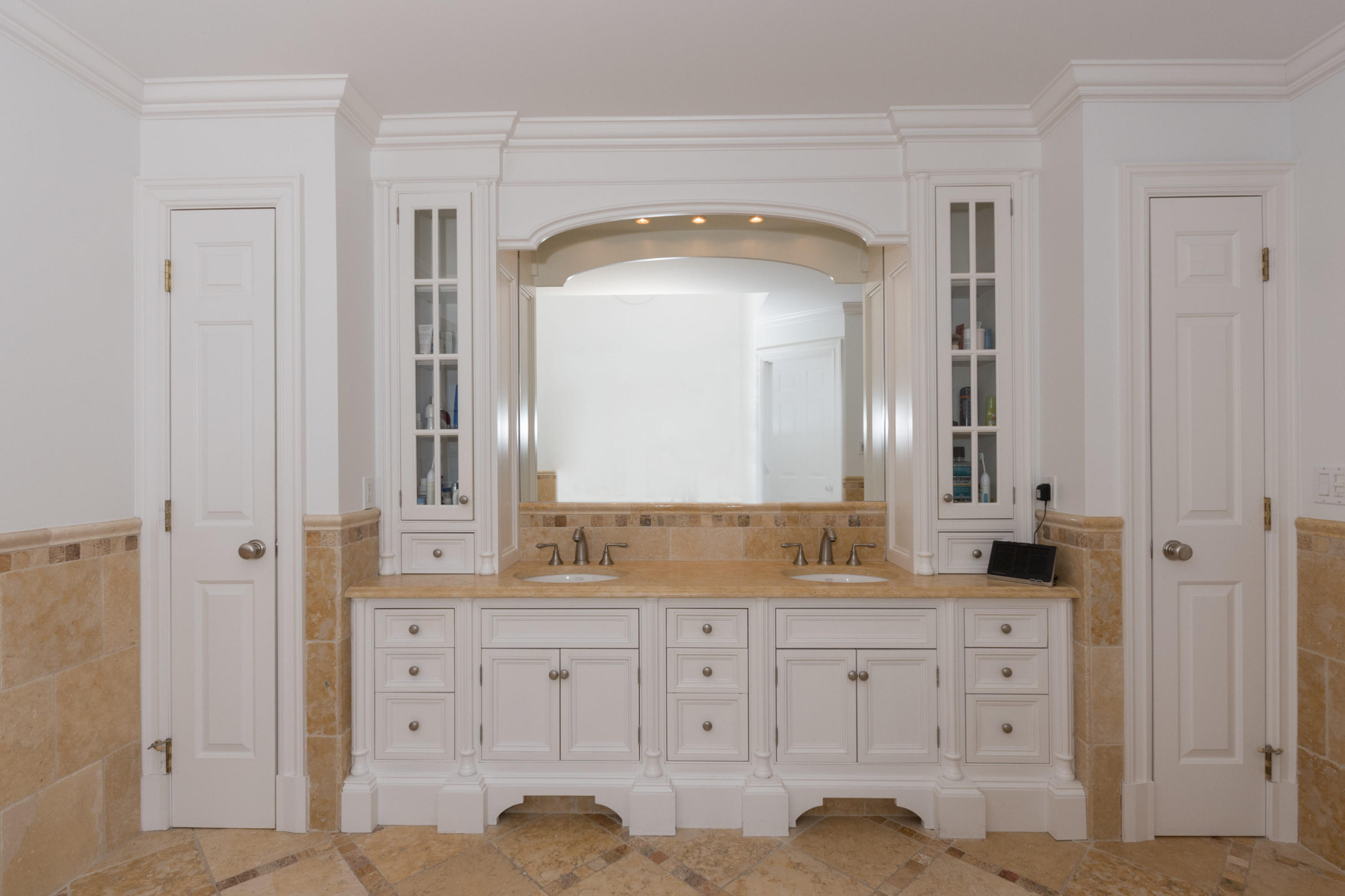 15 Seagate Road Darien, CT 06820 - Photo 29 of 48 a bathroom with a granite countertop sink and a mirror
