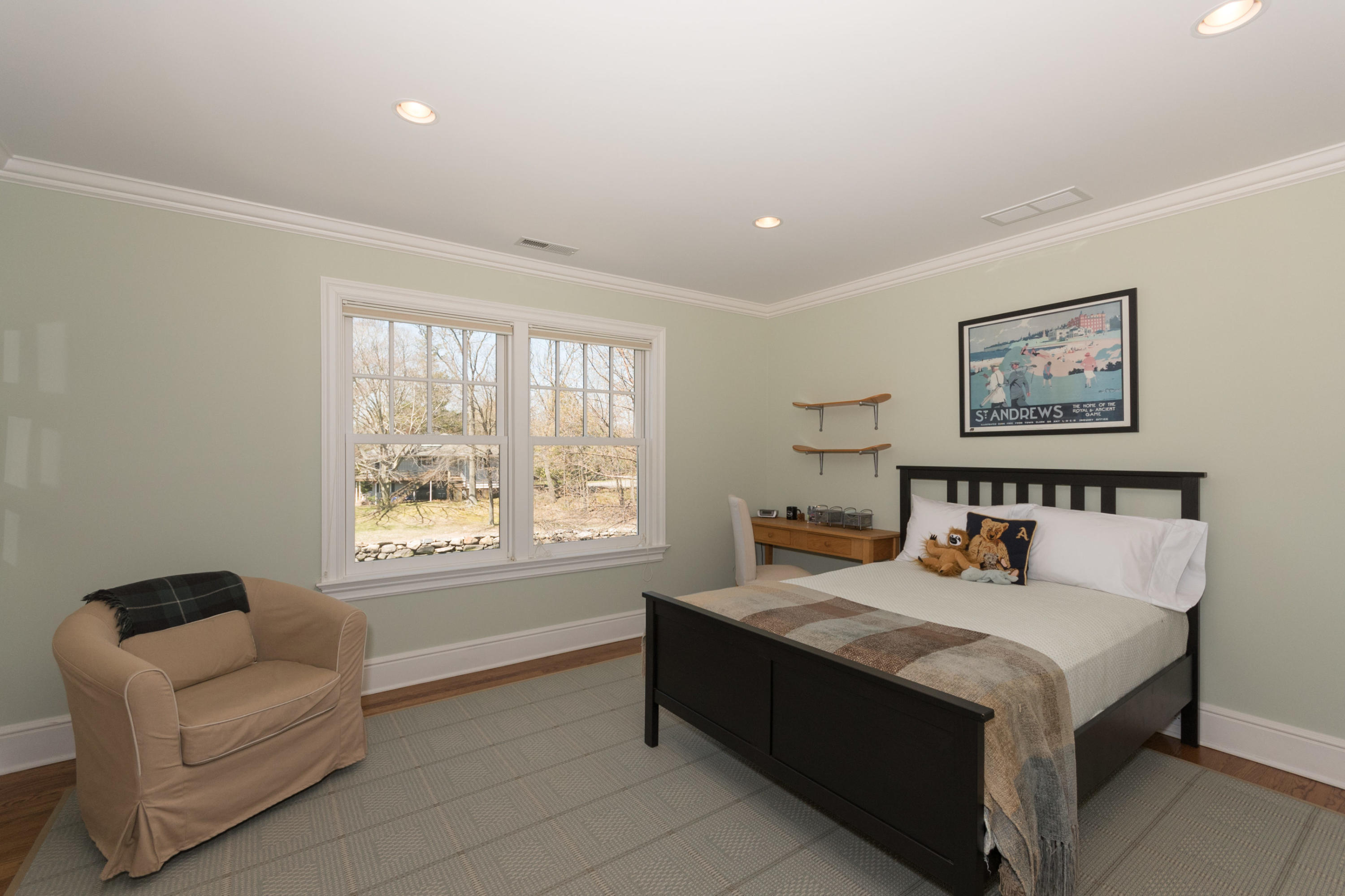 15 Seagate Road Darien, CT 06820 - Photo 31 of 48 a bed room with a bed and a couch