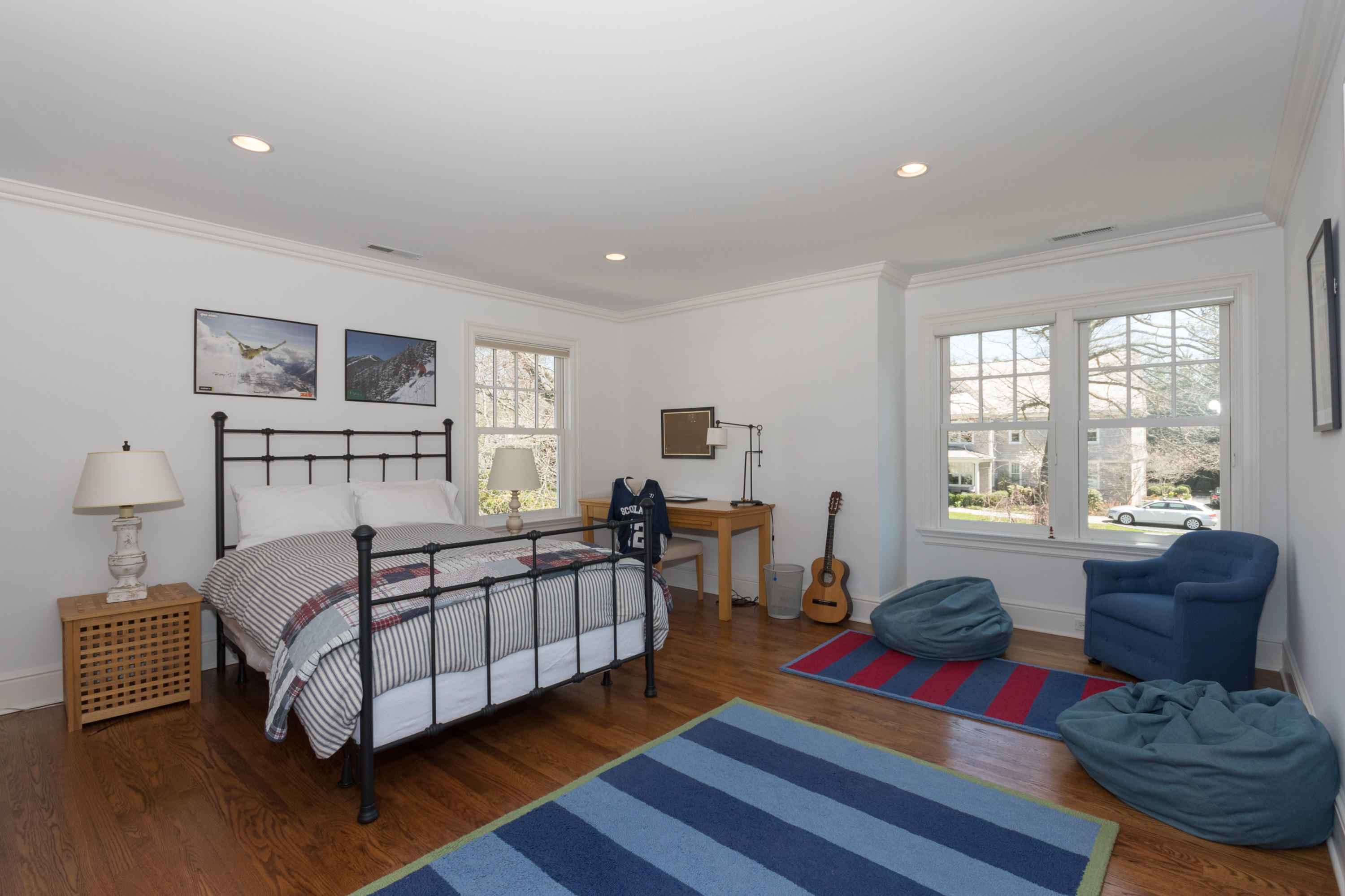 15 Seagate Road Darien, CT 06820 - Photo 34 of 48 a bedroom with furniture and a large window