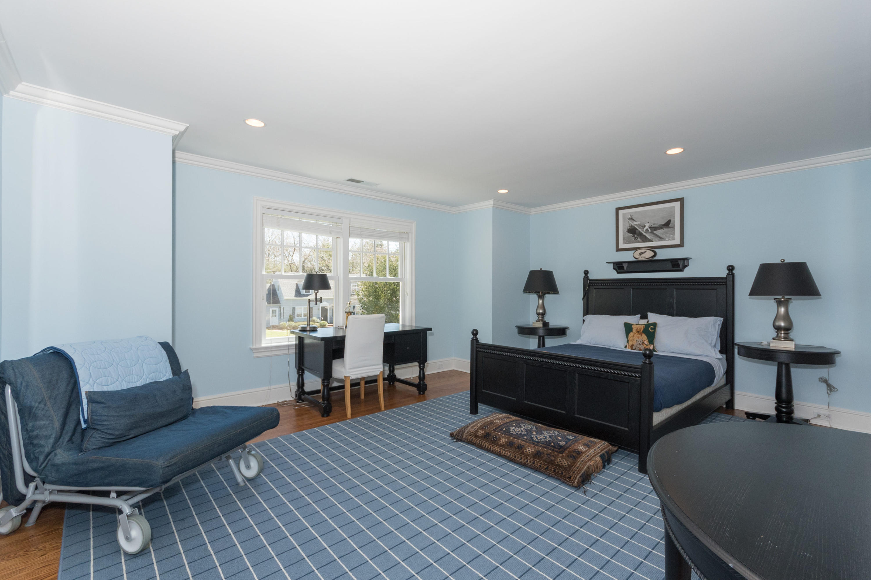 15 Seagate Road Darien, CT 06820 - Photo 35 of 48 a living room with furniture and a table
